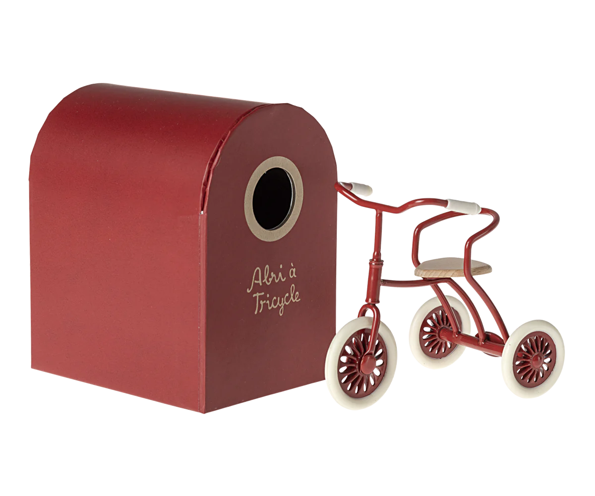 Vélo rouge pour souris et son abri