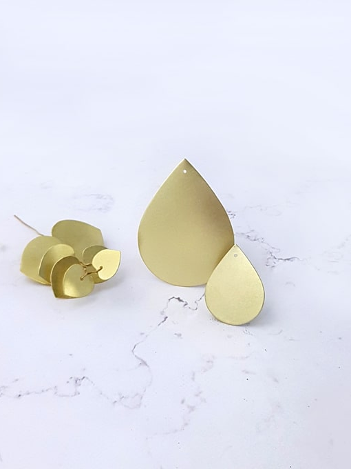 Duo de gouttes dorées