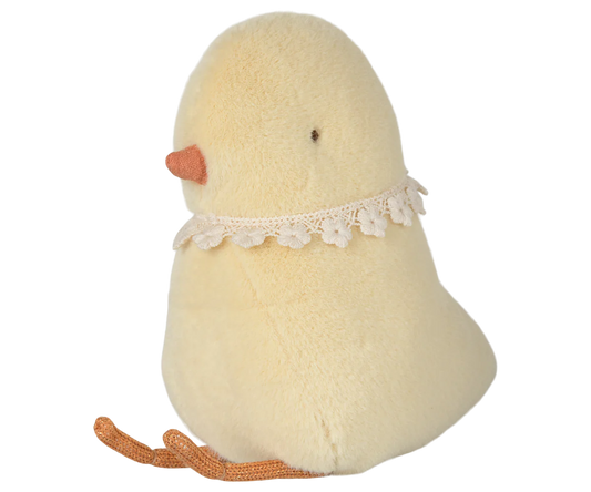 Oeuf de Pâques avec peluche poussin